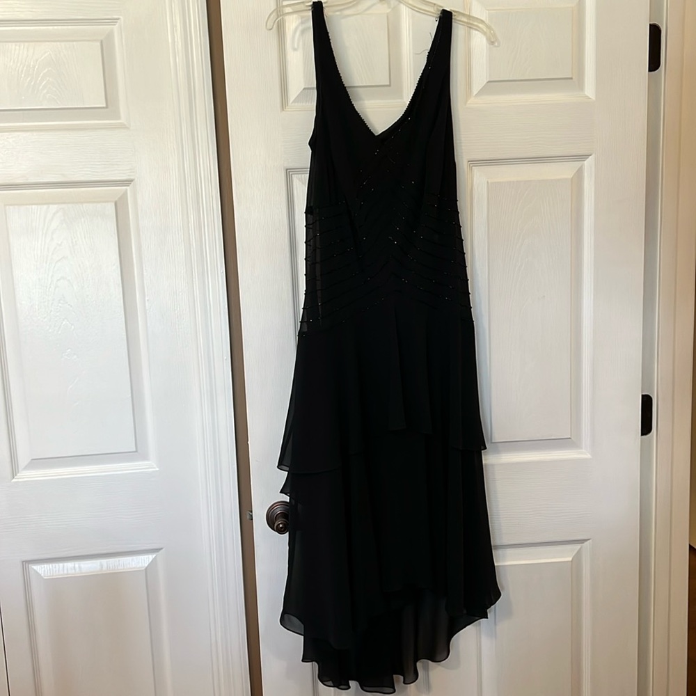 Cocktail dress. Black. Size 12.